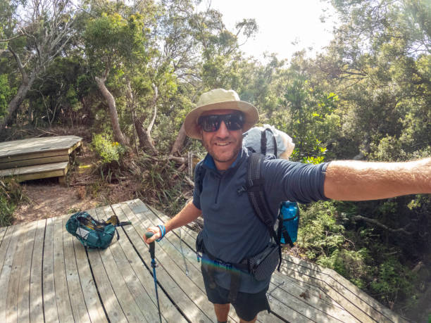 istock Man hiking in Tasmania taking a selfie 2040067117