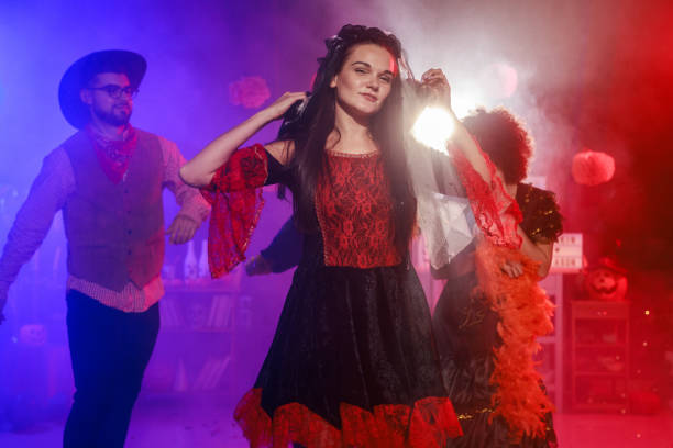 istock Having fun and dancing in costumes during a Halloween party 2040080872