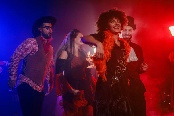 istock Having fun and dancing in costumes during a Halloween party 2040080880