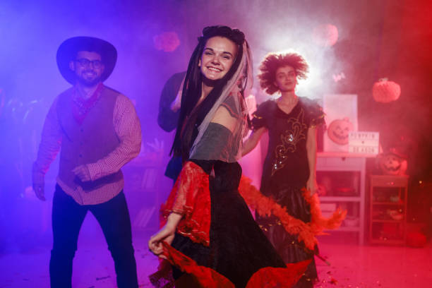 istock Having fun and dancing in costumes during a Halloween party 2040080881