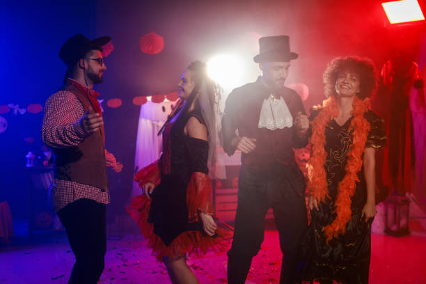 istock Having fun and dancing in costumes during a Halloween party 2040080883