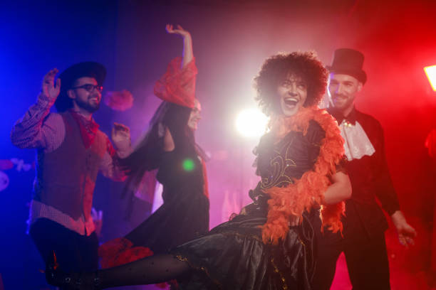 istock Having fun and dancing in costumes during a Halloween party 2040080892