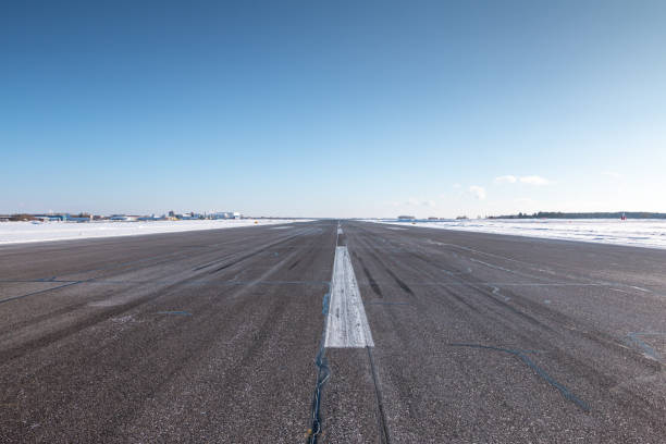 istock Empty airport runway on a clear cold winter day 2040088852