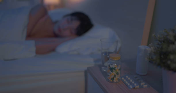 istock asain woman sleeping pills helping 2040113037