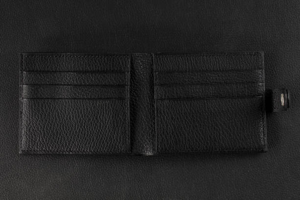 istock Black leather wallet business card holder on a black background. 2040119044