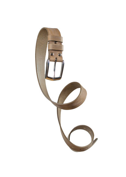 istock Beige leather belt twisted and isolated on a white background. 2040119619