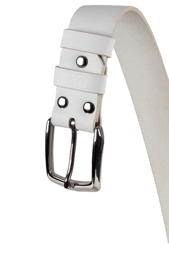 White leather belt with metal buckle beautifully curved close-up isolated on a white background.