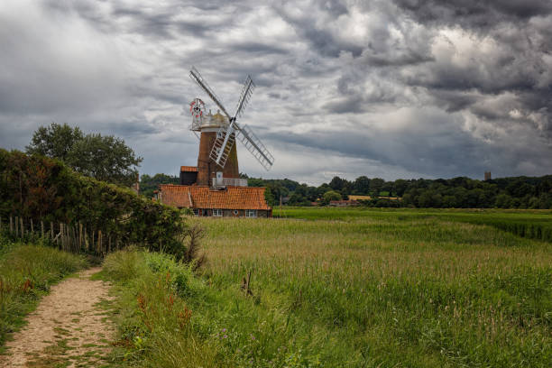 Stormy sky at Cley Windmill Norfolk England UK