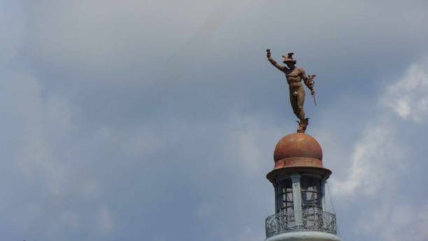 mini statue in top of the building  resemblance of  the austro hungarian style