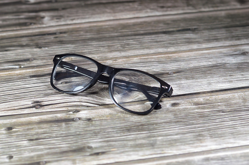 Glasses, eyeglasses or spectacles,  vision eyewear with lenses, typically used for vision correction, such as with reading glasses and glasses used for nearsightedness, safety glasses for protection, selective focus