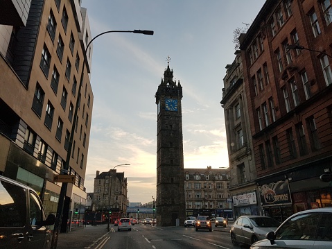 Cityscape, old Tolbooth Steeple and clock, at a street, High Street, Glasgow Scotland England UK