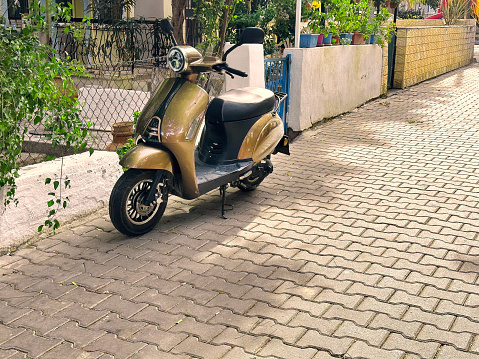 Moped parked by building exterior in Foca,Izmir