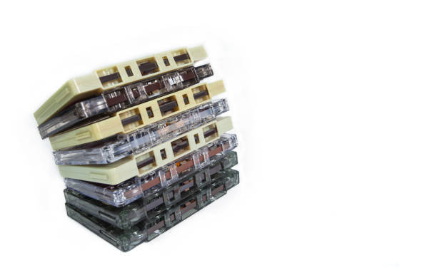 istock Stack of old vintage cassettes isolated on white background 2040213128