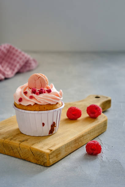 istock Birthday cupcake with a candle 2040217527