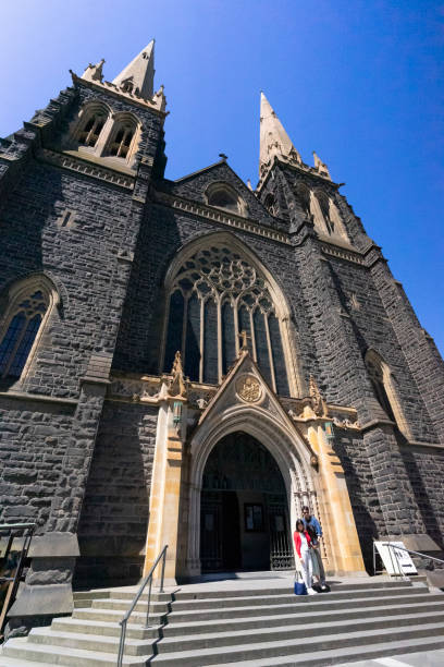 Melbourne, Australia - December 29,2023 : Historical St. Patrick's Cathedral with blue sky in Melbourne, Australia on December 29,2023.