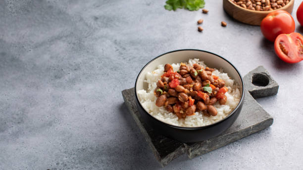 istock Vegan bean curry with rice and tomatoes. Indian cuisine. Vegetarian dish. 2040238043
