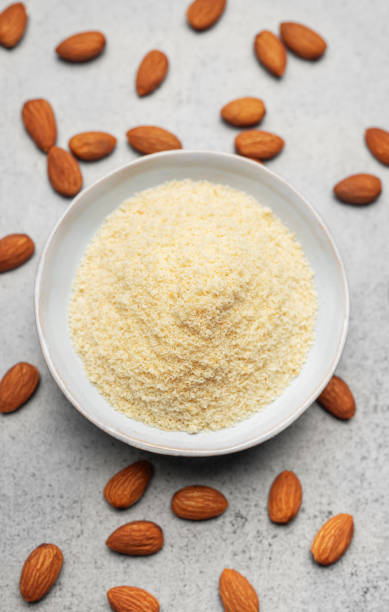 istock Fresh almond flour in a  bowl and almonds 2040238577