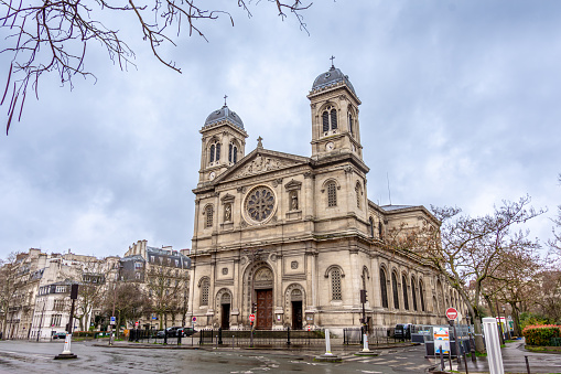 Paris, France - February 25, 2024: Exterior view of the Saint-François-Xavier Catholic Church, a historic monument located on Boulevard des Invalides, in the 7th arrondissement of Paris, France