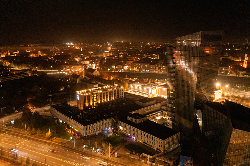 Drone photography of night city lights during autumn cloudless