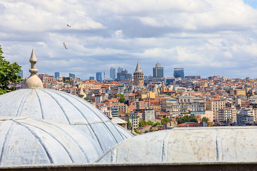 Istanbul skyline from the Suleymaniye Mosque of the city in Turkey. Grand Ottoman imperial mosque designed by Mimar Sinan. Commissioned by Suleiman the Magnificent in 1500s. UNESCO heritage site