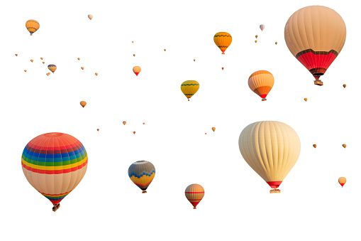 hot air balloons flying on white background. Against pure white backdrop, colorful balloons as if they have escaped from of storybook, with vivid colors contrasting sharply against blank background.