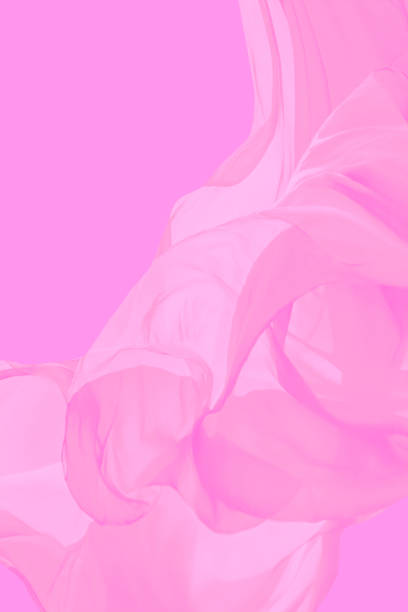istock Calm vertical pink background with flying fabric. 2040295446