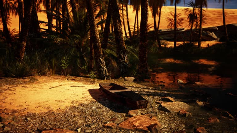 A wooden boat sitting on top of a dirt field