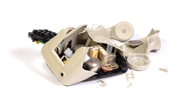 istock Part of a broken old telephone, phone with dial plate - plastic phone 2040322204