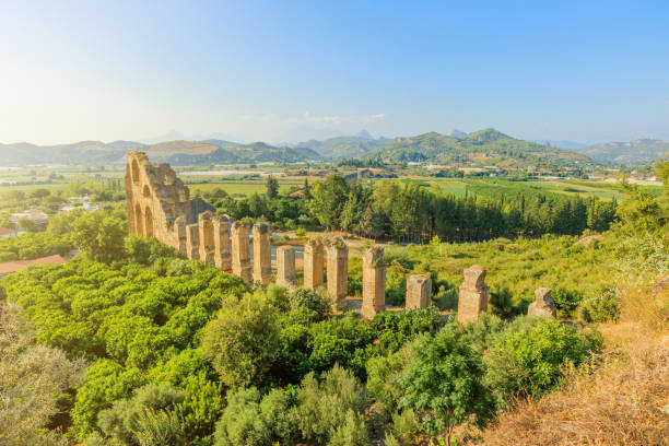 Aerial view of Roman aqueduct in Aspendos in Turkey, well-preserved ruin of Roman engineering and architectural prowess. Built during Emperor Marcus Aurelius reign in 2nd century AD.