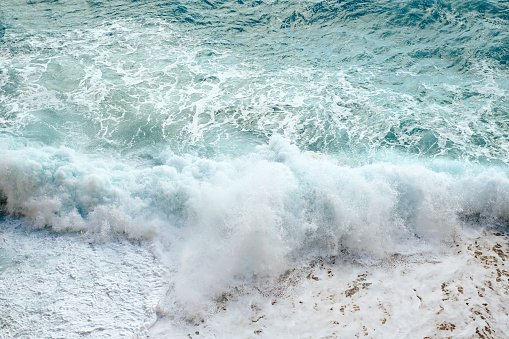 Ideal surfing wave in Atlantic ocean. Glassy turquoise wave