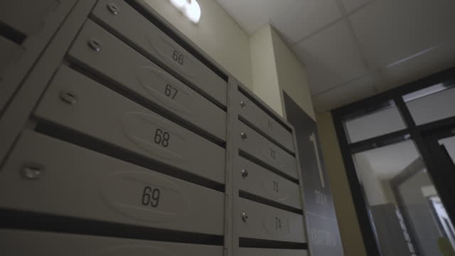Mailboxes with numbers at entrance of residential building