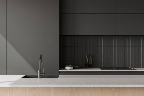 istock Stylish home kitchen interior with counter, sink and kitchenware with shelves 2040391529