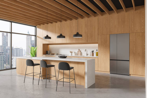istock Cozy home kitchen interior with bar counter and panoramic window 2040394683