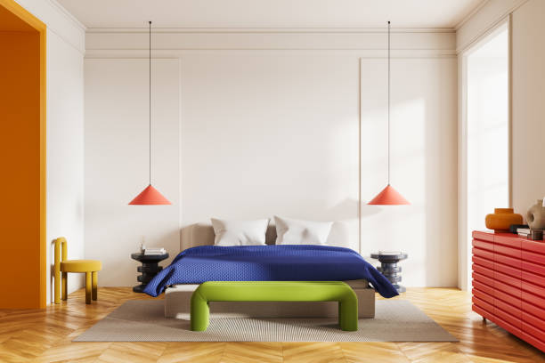 istock Colorful hotel bedroom interior with bed, sideboard and window. Mock up 2040400549