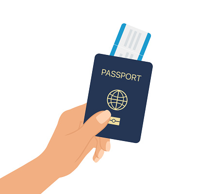 Hand Holding Passport And Boarding Pass On White Background