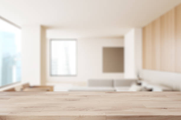 istock Empty wooden table on background of living room with panoramic window. Mockup 2040406967