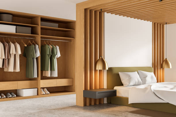 istock Modern hotel bedroom interior with bed, wardrobe and clothes. Mockup canvas 2040407504