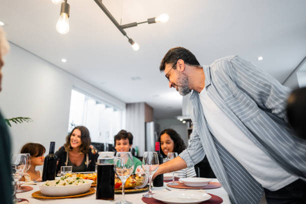 istock Family having lunch together at home 2040411285