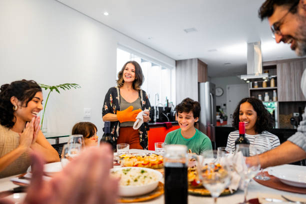 istock Family having lunch together at home 2040411295