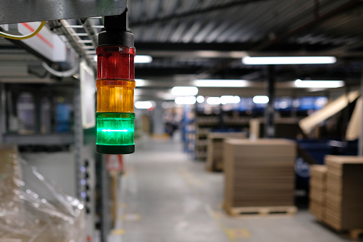 Green light indicating smooth operations in a warehouse