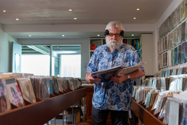 istock Record store owner in  his shop 2040450632