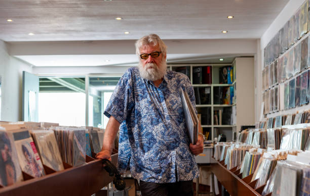 istock Record store owner in  his shop 2040451150