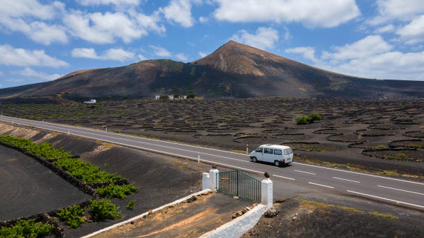 istock Van on the road through La Geria in Lanzarote 2040478011