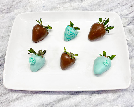 Tiffany Blue & Milk Chocolate Covered Strawberries on A White Plate