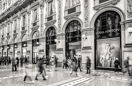 Milan, Italy - April 13, 2018: People walking in Inside shopping mall Galleria Vittorio Emanueke II