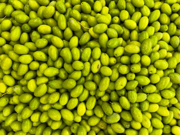 istock Food backgrounds; green olives. 2040522327