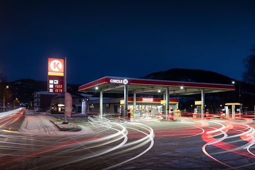 Hommelvik, Norway – February 09, 2022: A Long exposure of a Circle K gas station in Norway with cars driving in and out
