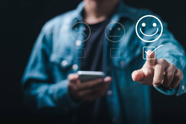 istock Customer satisfaction service concept. User rate satisfaction by smiling face, on online application. satisfaction feedback review, good quality most. 2040543603
