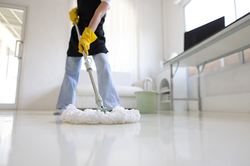 Vacuum cleaner on the blue carpet floor