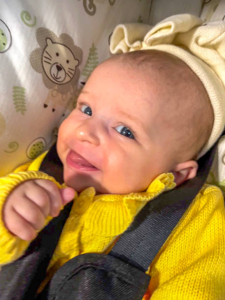 Two month baby awake and smiling